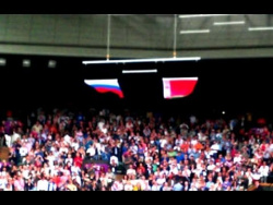 US flag falls at the first chords of the Russian national anthem. US flag falls at the first chords of the Russian national anthem.